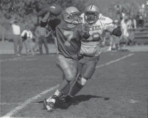 Senior Captain Eric Wicks runs down Manouge's QB D.J. Benardis.