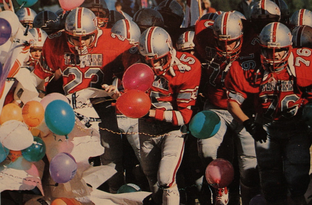 Homecoming 1986 (45) Mike Donchez leads the team out for the second half followed by (76) Brian Hadley and (23) Corey Ray