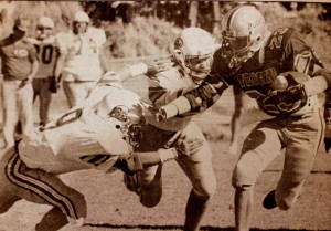 (23) Estabrook stiff arms Greg Hill of Fallon. 