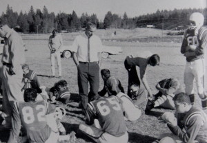 Coach Holback addresses his team at halftime 