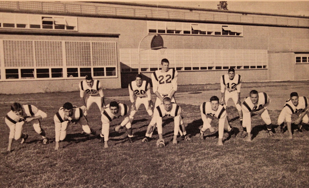 3 of the 4 back were Hall of Famers, (25) Butch Smith, (20) Steve Besio, and (22) Greg Moore