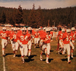 The Wolverines take the field for the first "Little Big Game" which was also Homecoming in 74'. 