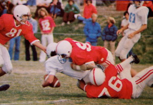 (76) David Turnquist and (50) Paul Mezger take down a Laker 