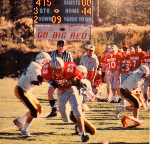 (23) Matt Estabrook is forced out of bounds by Incline players