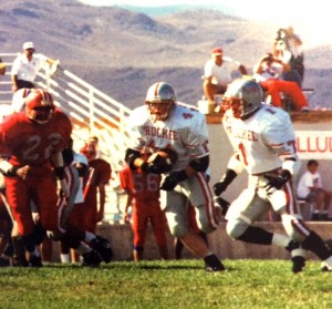 Josh Robinson looks for open field as Van-Brunt lead blocks.