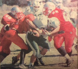 Brad Noel wraps up the ball carrier vs Battle Mountain 