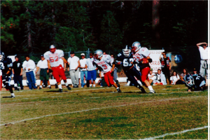 Kris Vickers intercepts Brolliar and heads for six as Travis Hoag (43) and Matt Rippee (52) look on.